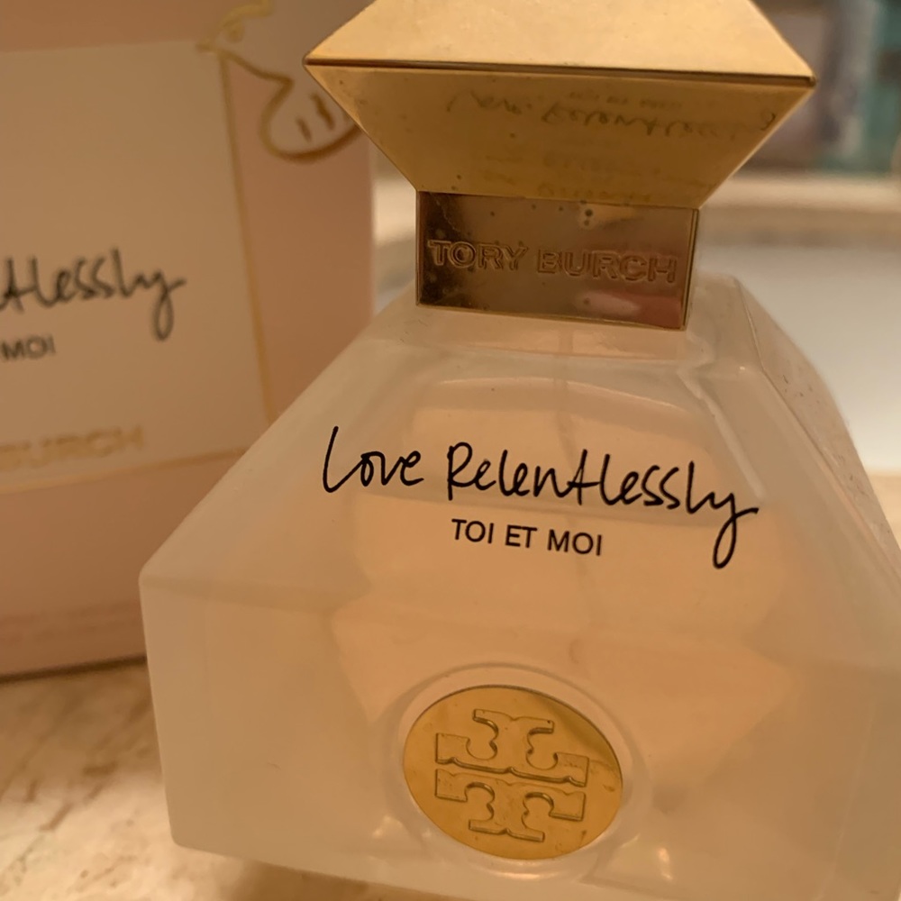 Tory Burch Love Relentlessly perfume. Used a handful of times. Beautiful scent.